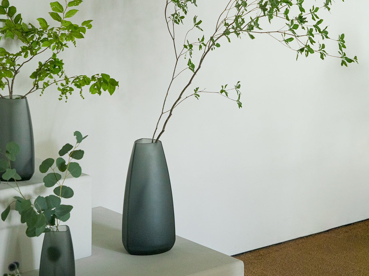  TRE vases in various shapes and sizes in the Smoke colourway 