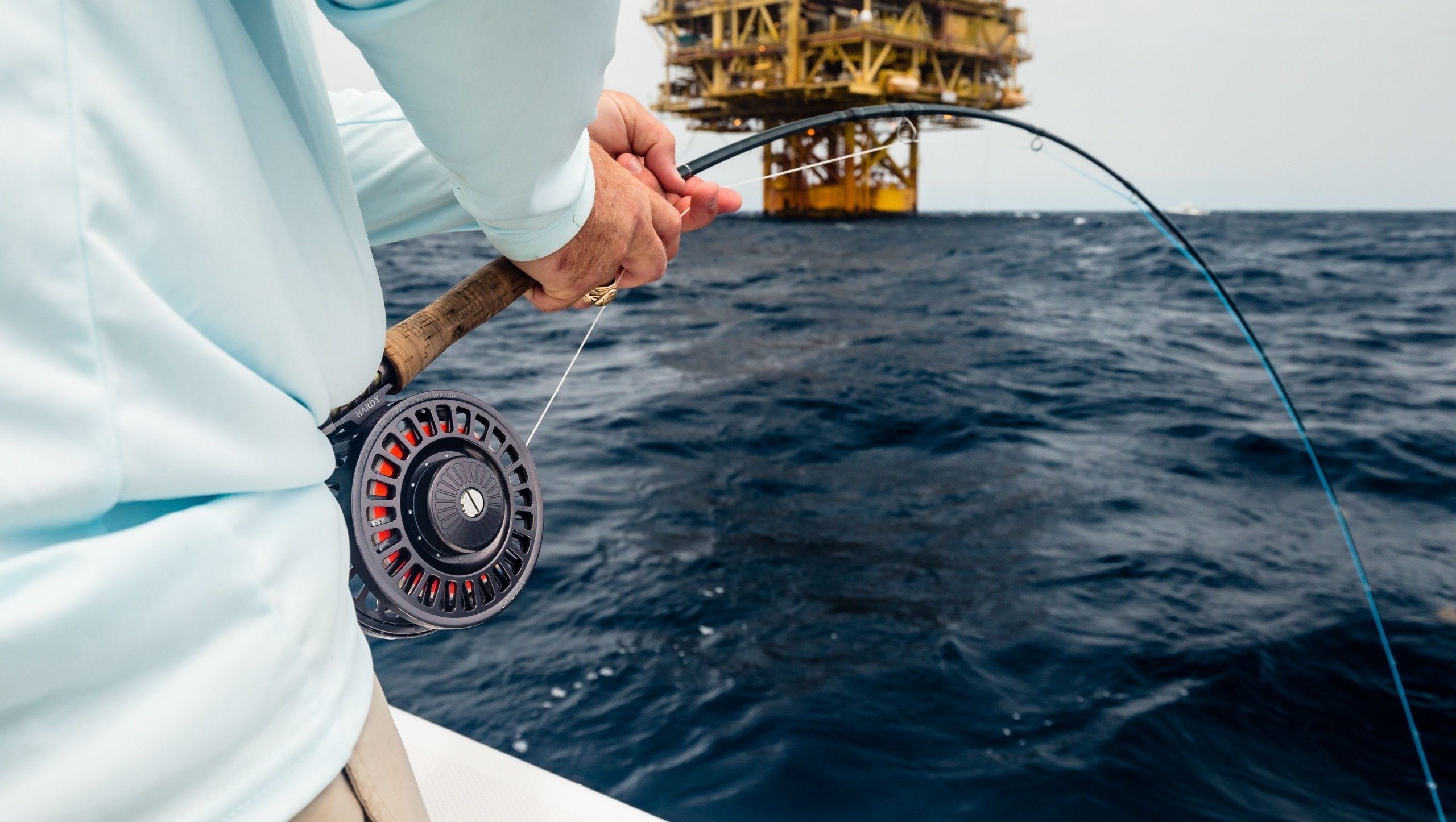 Fishing Rod And Reel On Boat Stock Photo - Download Image Now