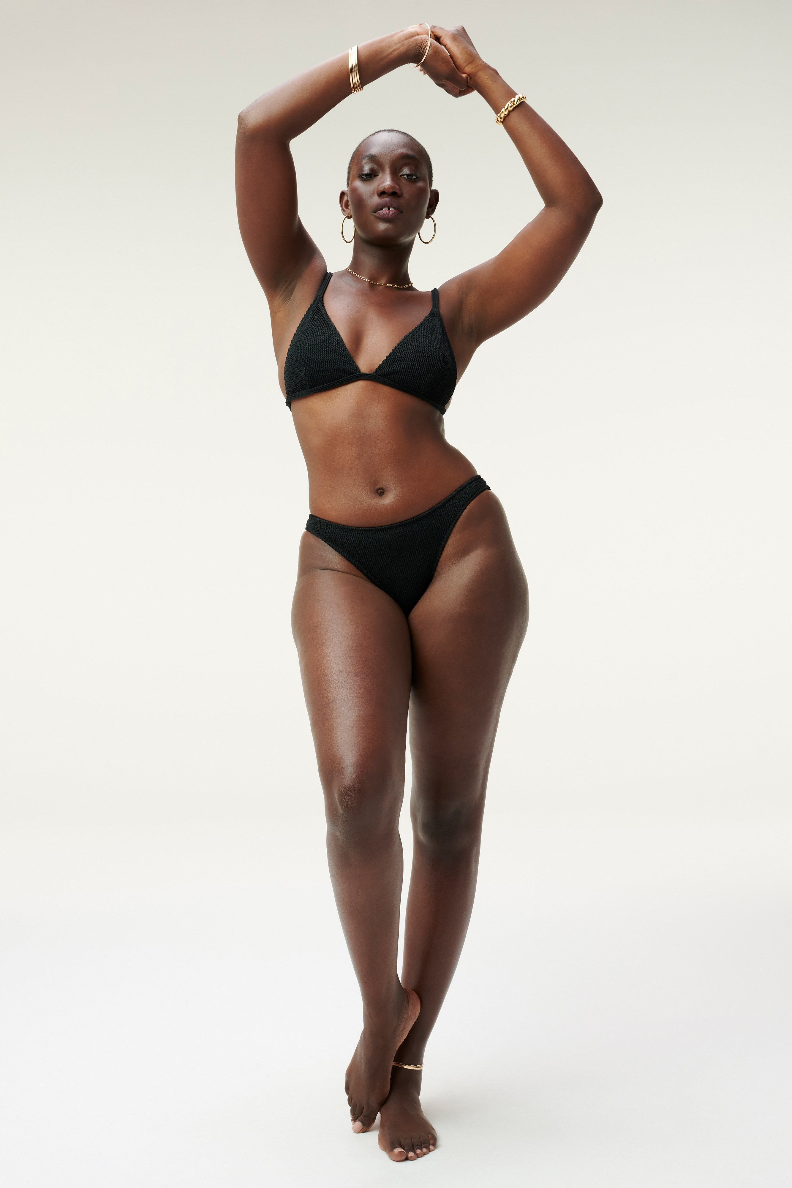 ALWAYS FITS BETTER CHEEKY in BLACK001 styled with our ALWAYS FITS PERFECT FIT BIKINI TOP in BLACK001, LEG DAZE SARONG in BLACK001,