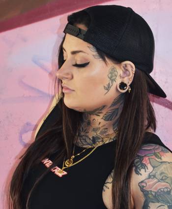 Women wearing alternative Gold Black Diamond Steel Ear Stretching Plug / Gauge