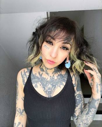 Girl wearing cute Opalite Glass Oval Keyhole Ear Weights - Pair