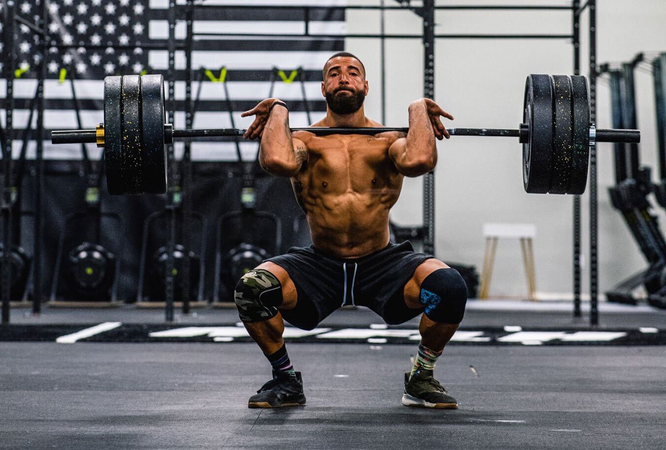 front squats with olympic bar and crumb rubber plates