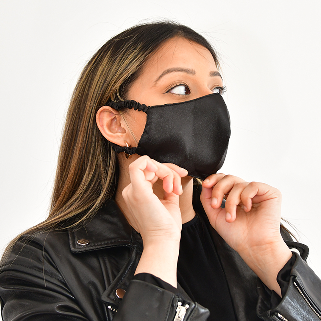 Woman wearing the Fanci Mask in Black Satin