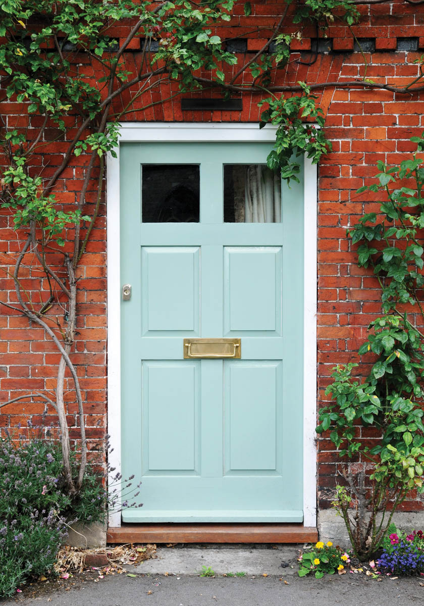 A pale blue grey door painted with Beaufort Gardens No.212