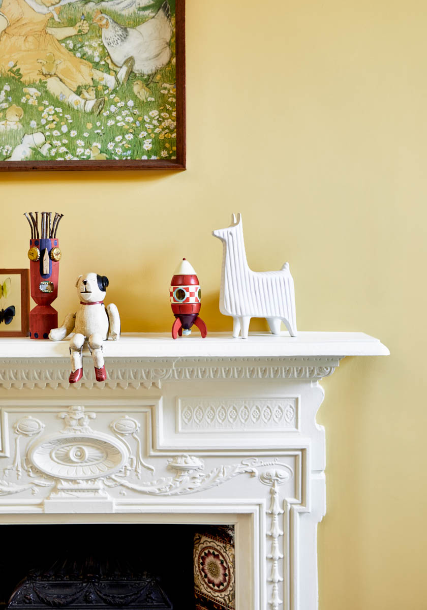 Bright orange yellow walls in a children's bedroom painted with Golden Square No.131

