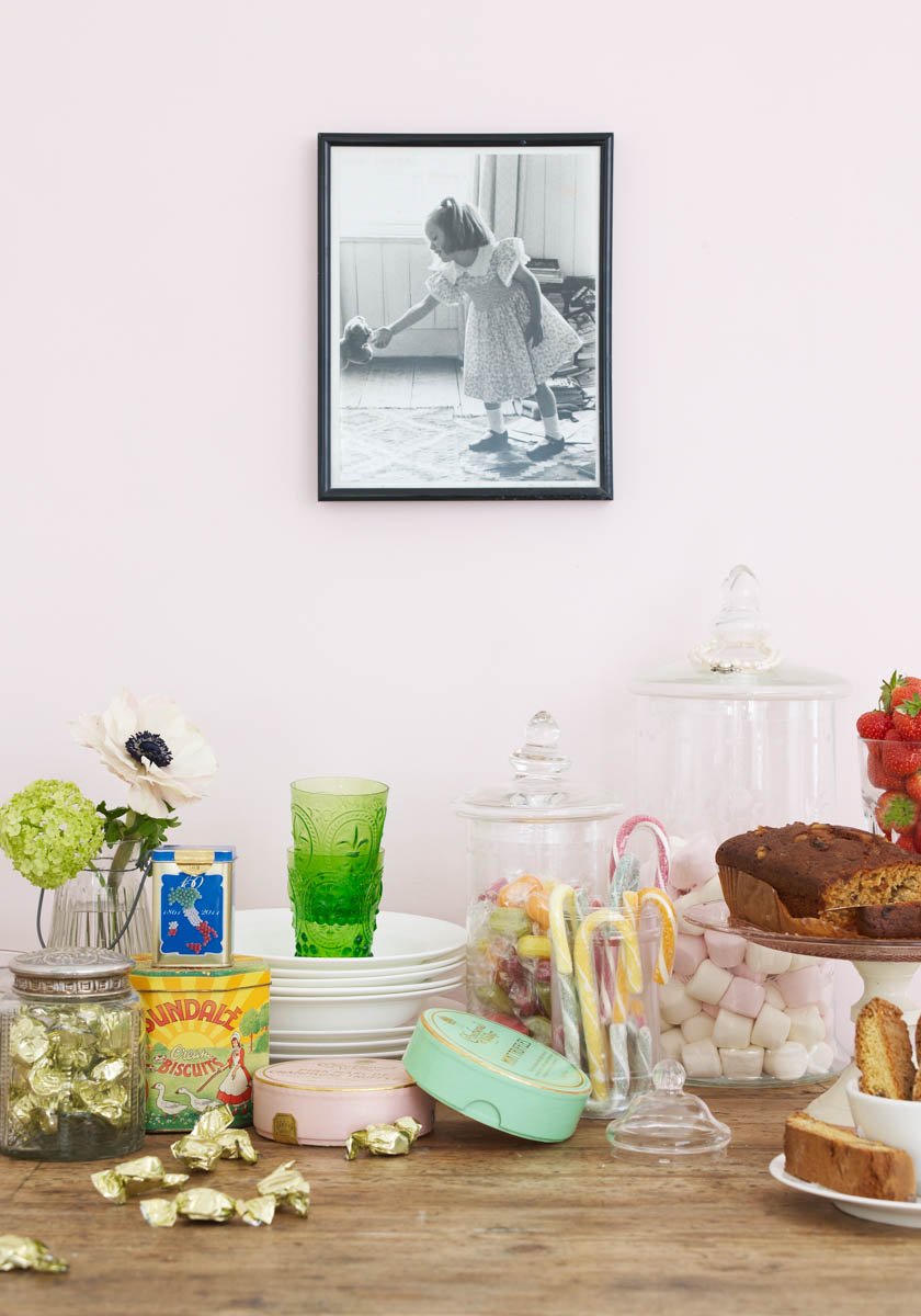 Cakes and sweets in front of pastel pink walls painted with Palmerston Pink No.243

