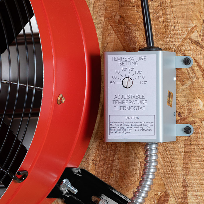 Close-up of the adjustable thermostat pre-wired to the attic fan.