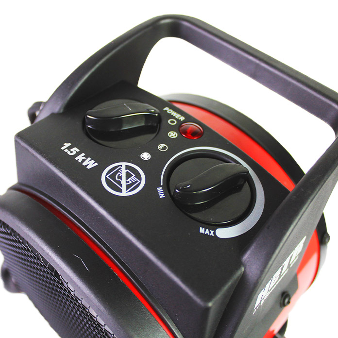 Close-up of fan only, heat, and temperature dials.