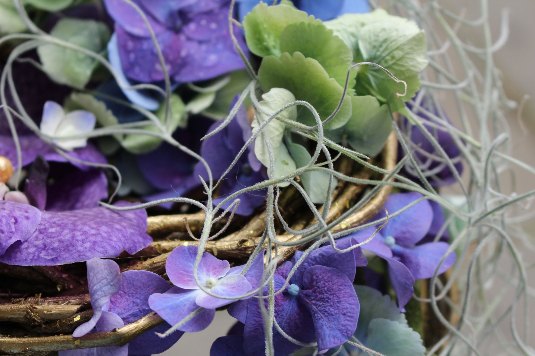 Closeup of purple wedding bouquet. 