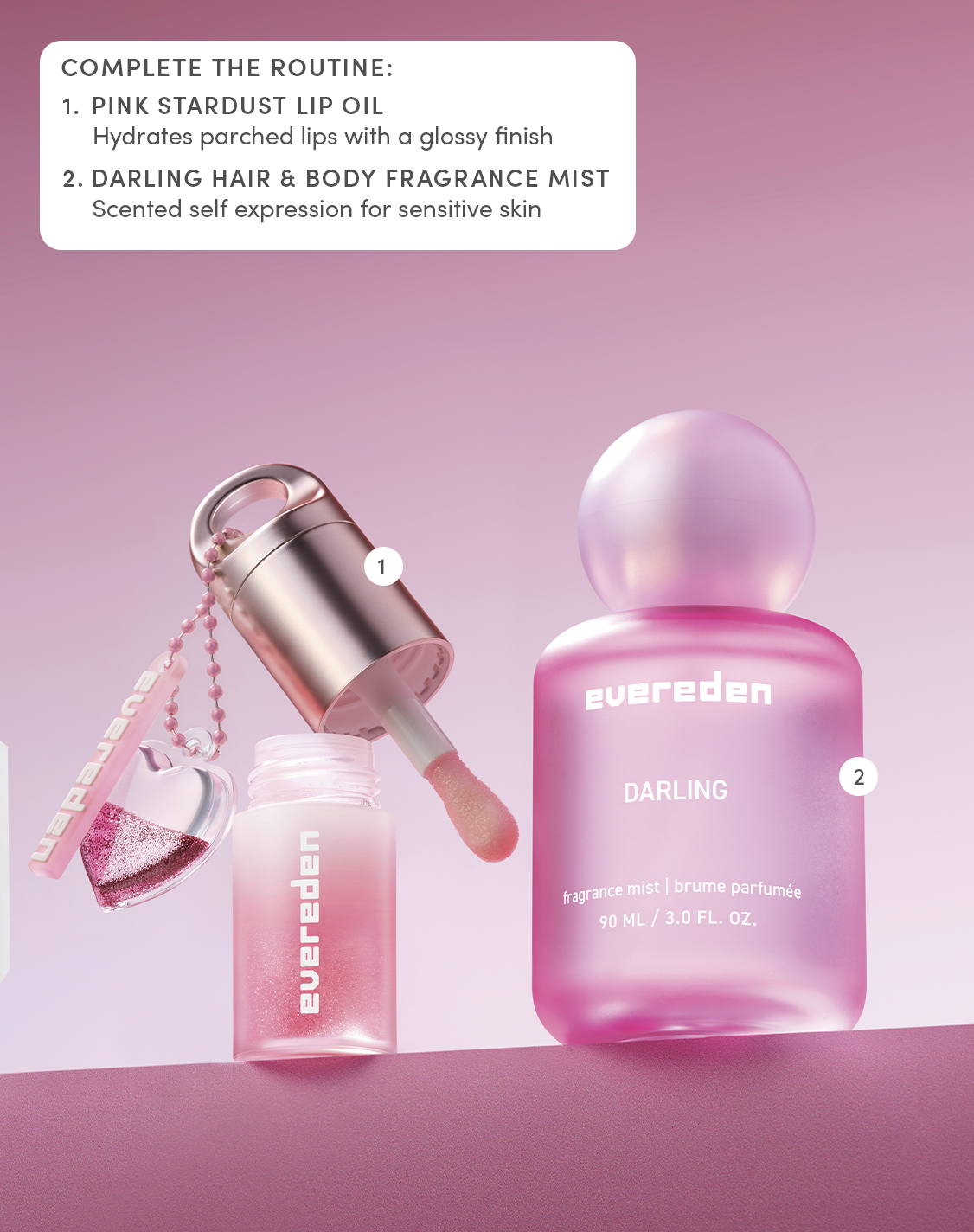Evereden Pink Stardust Hydrating Tinted Lip Oil with heart charm alongside Darling Hair & Body Fragrance Mist on a soft pink background.