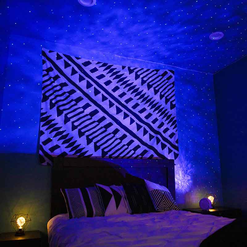 sky lite galaxy projector in bedroom