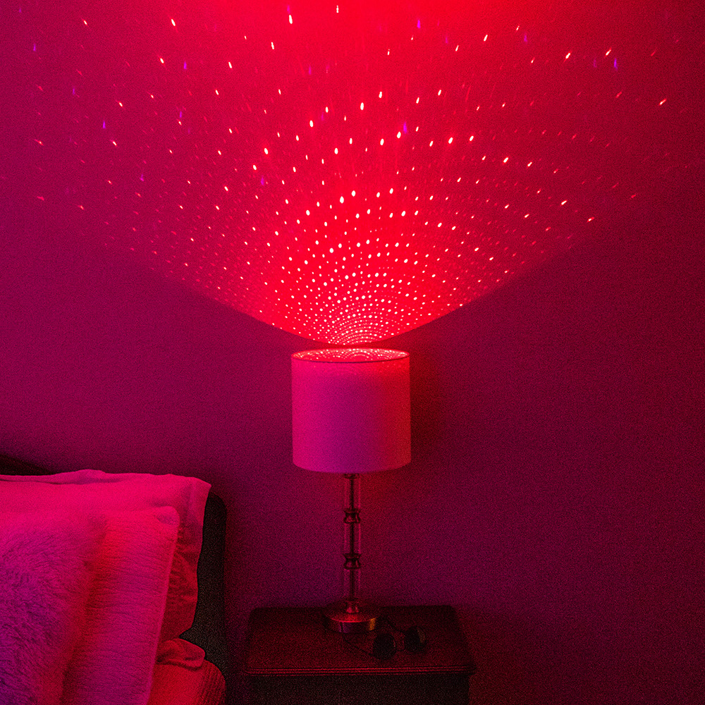 red blissbulb laser lightbulb in lamp