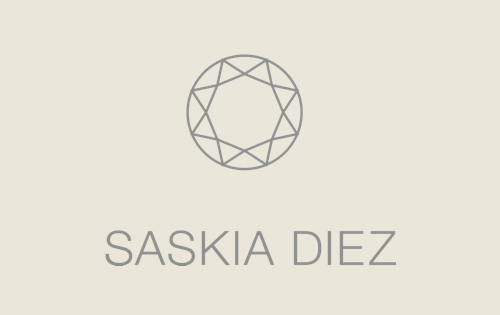 Single Pearl Bow Stud Earrings by Saskia Diez