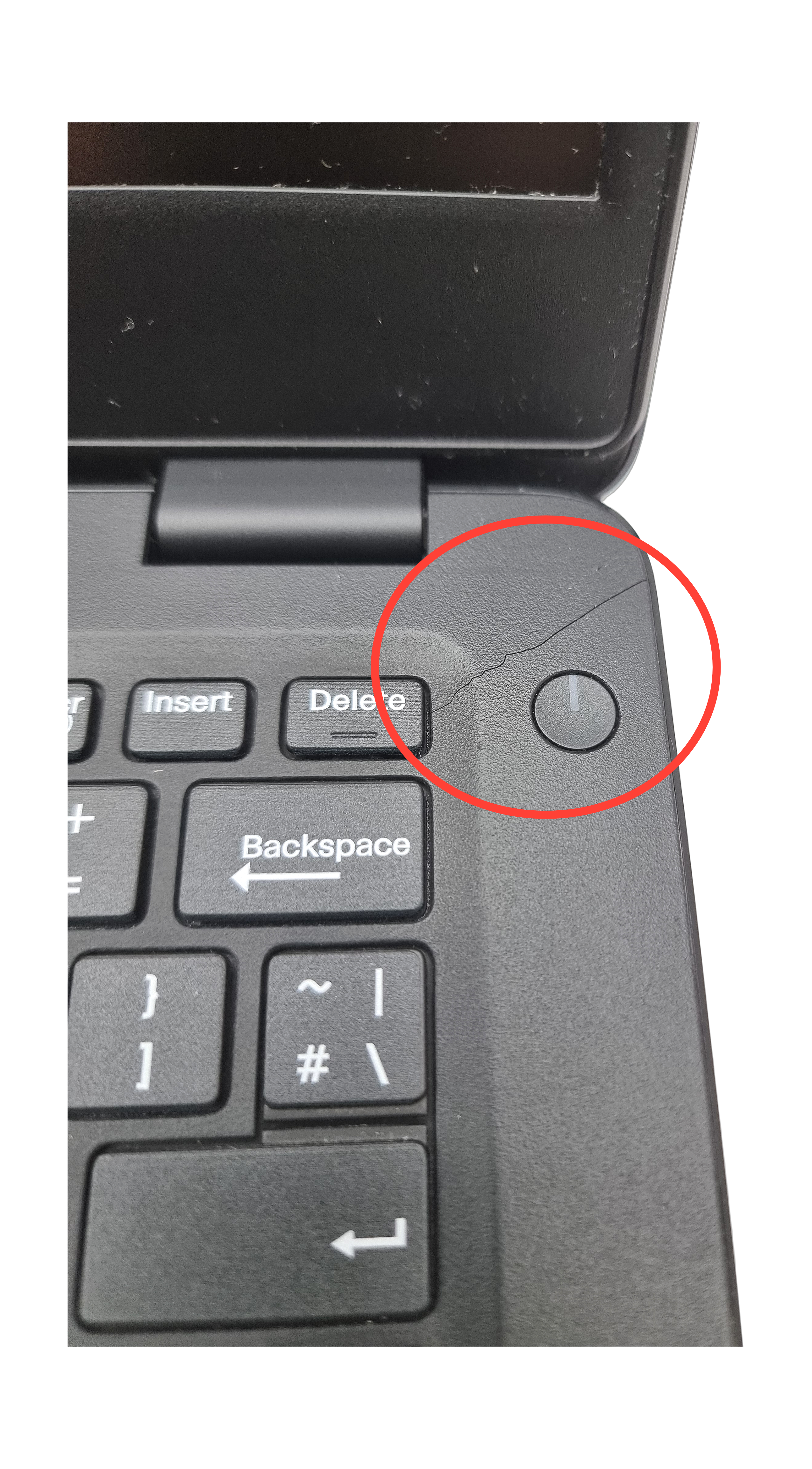 Device #1 - Small crack Above Power Button