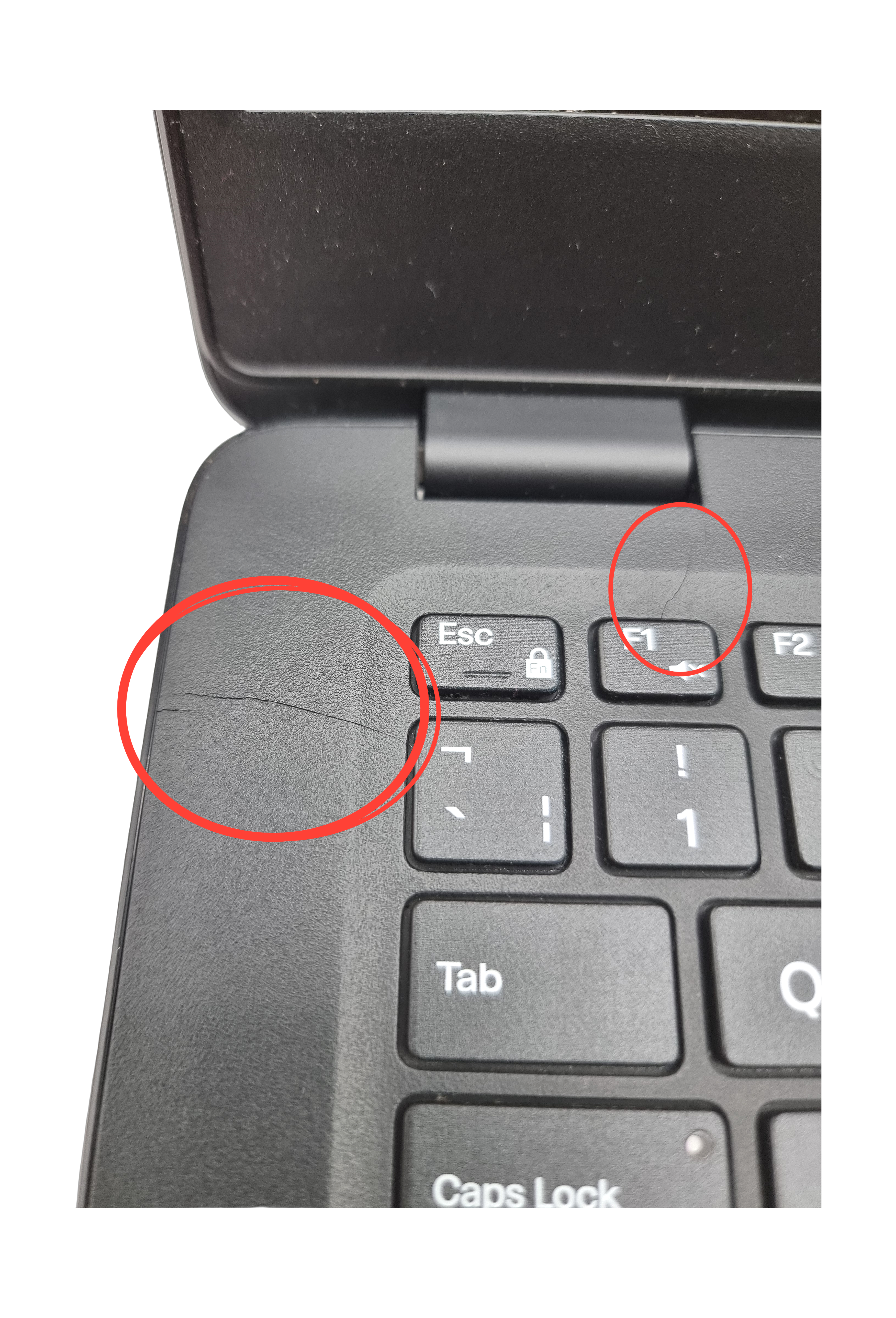 Device #1 - Small crack next to ESC Key