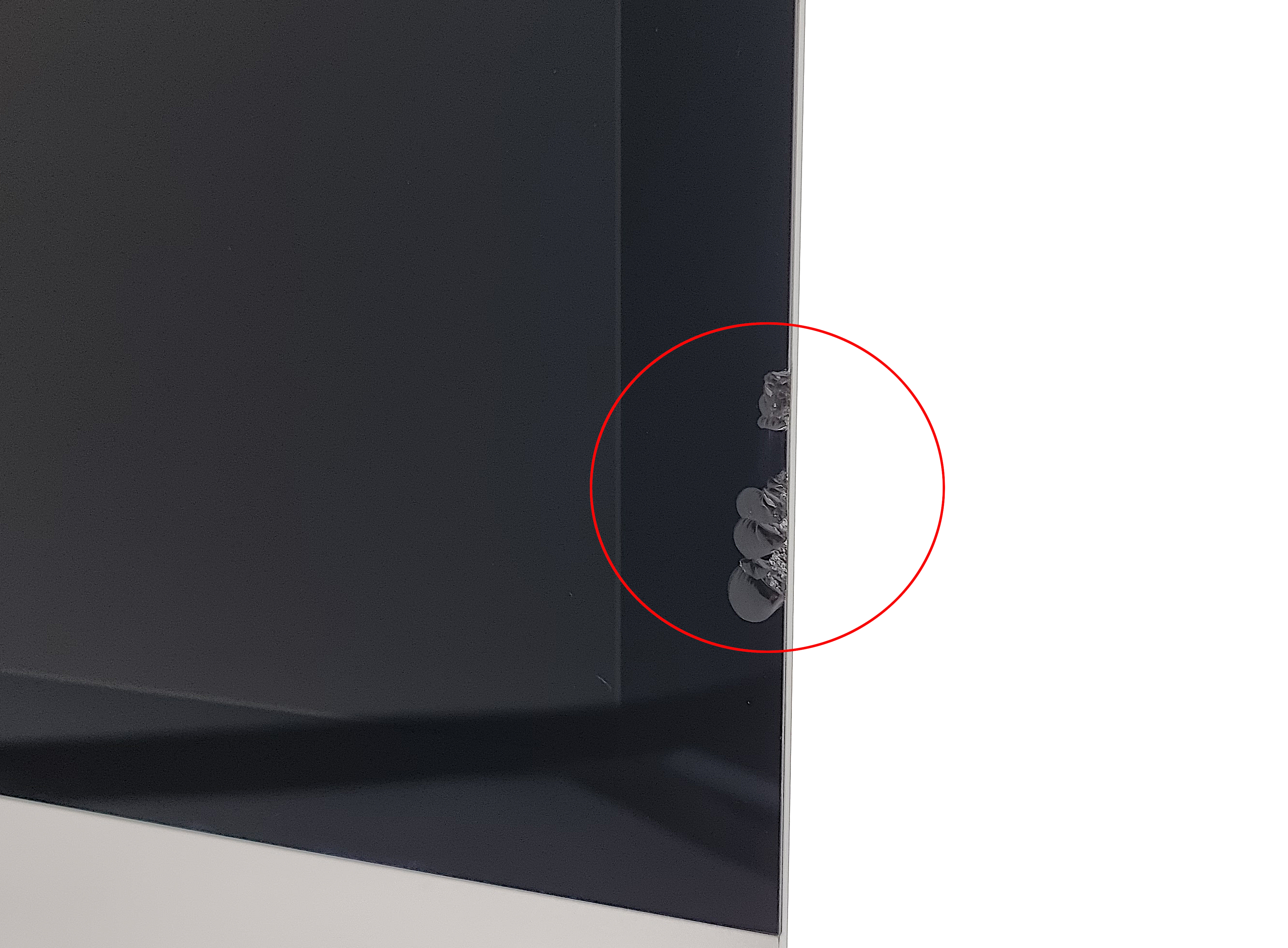 Device #1 - Chipped glass on the bottom right of screen