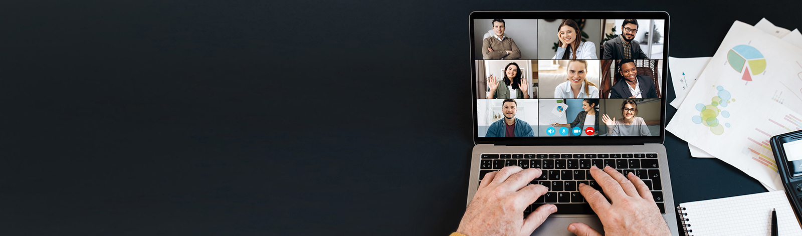 Top view of laptop screen with video conference participants