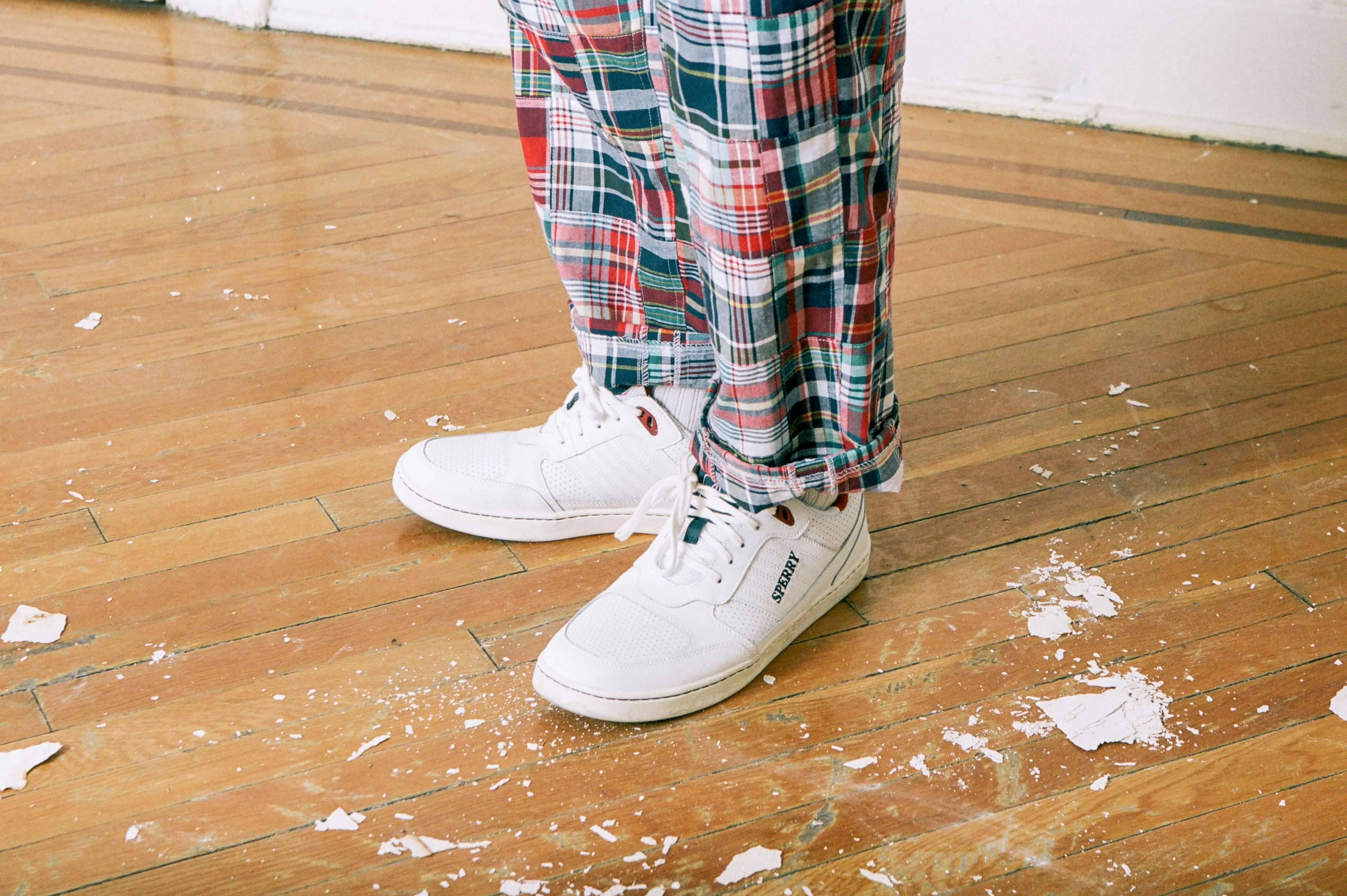 Male model wearing the Bishop Patchwork Madras Trousers