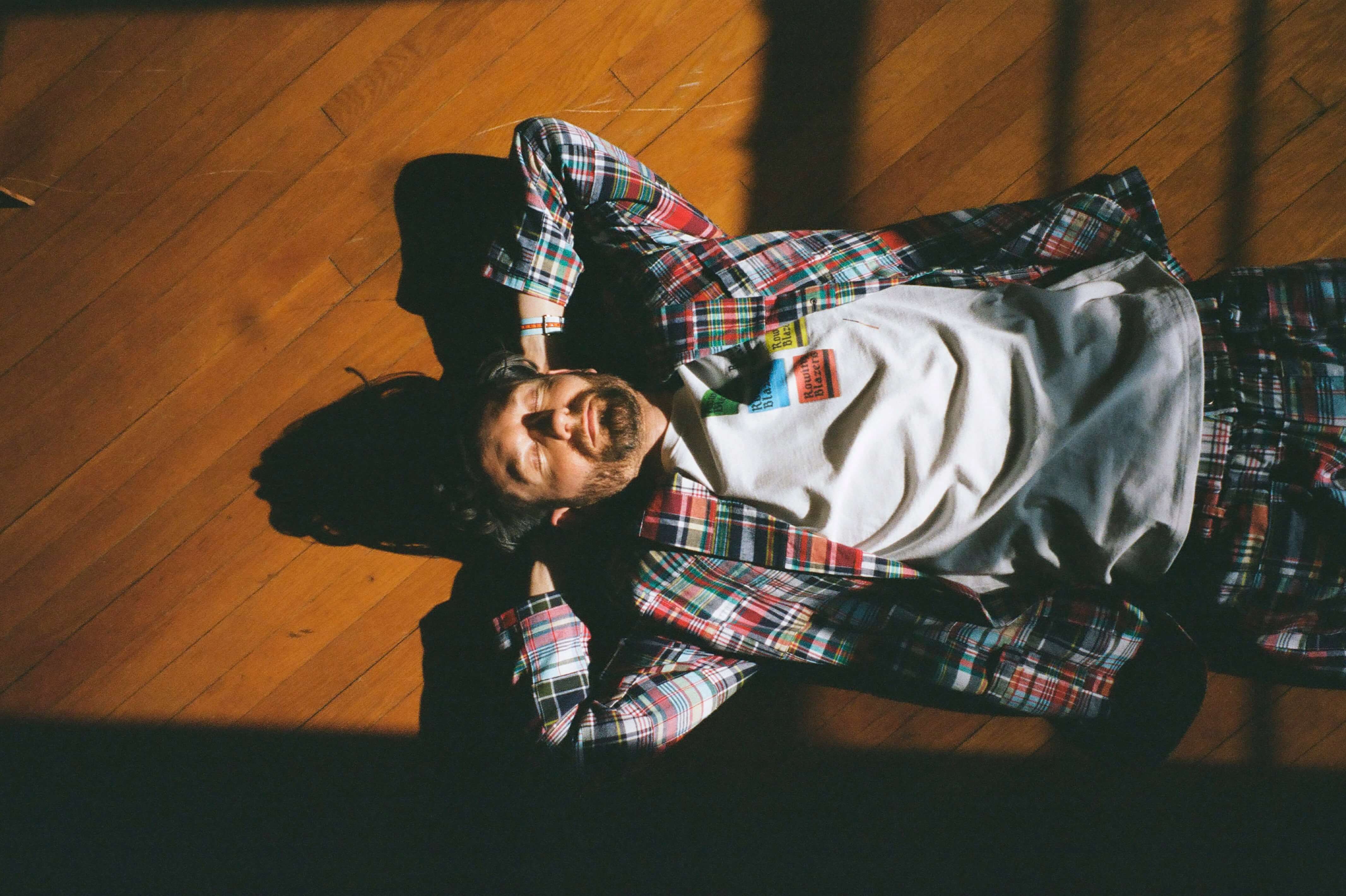 Male model wearing the Bishop Patchwork Madras Blazer and the Bishop Patchwork Madras Trousers