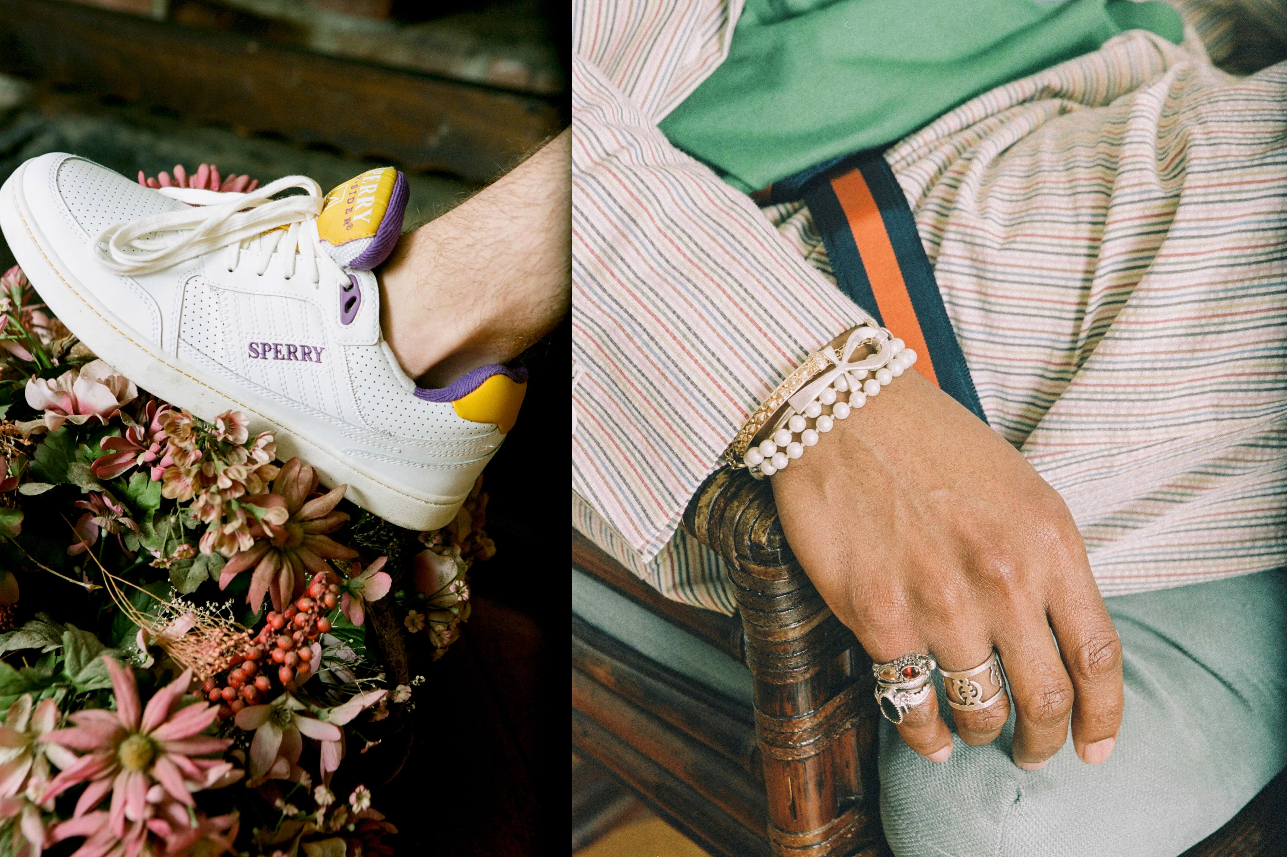 Male model wearing the Sperry X Rowing Blazers Cloud Cup Sneaker in purple and gold. Male model wearing the Croquet Seersucker Blazer and the Grosgrain belt in navy and orange