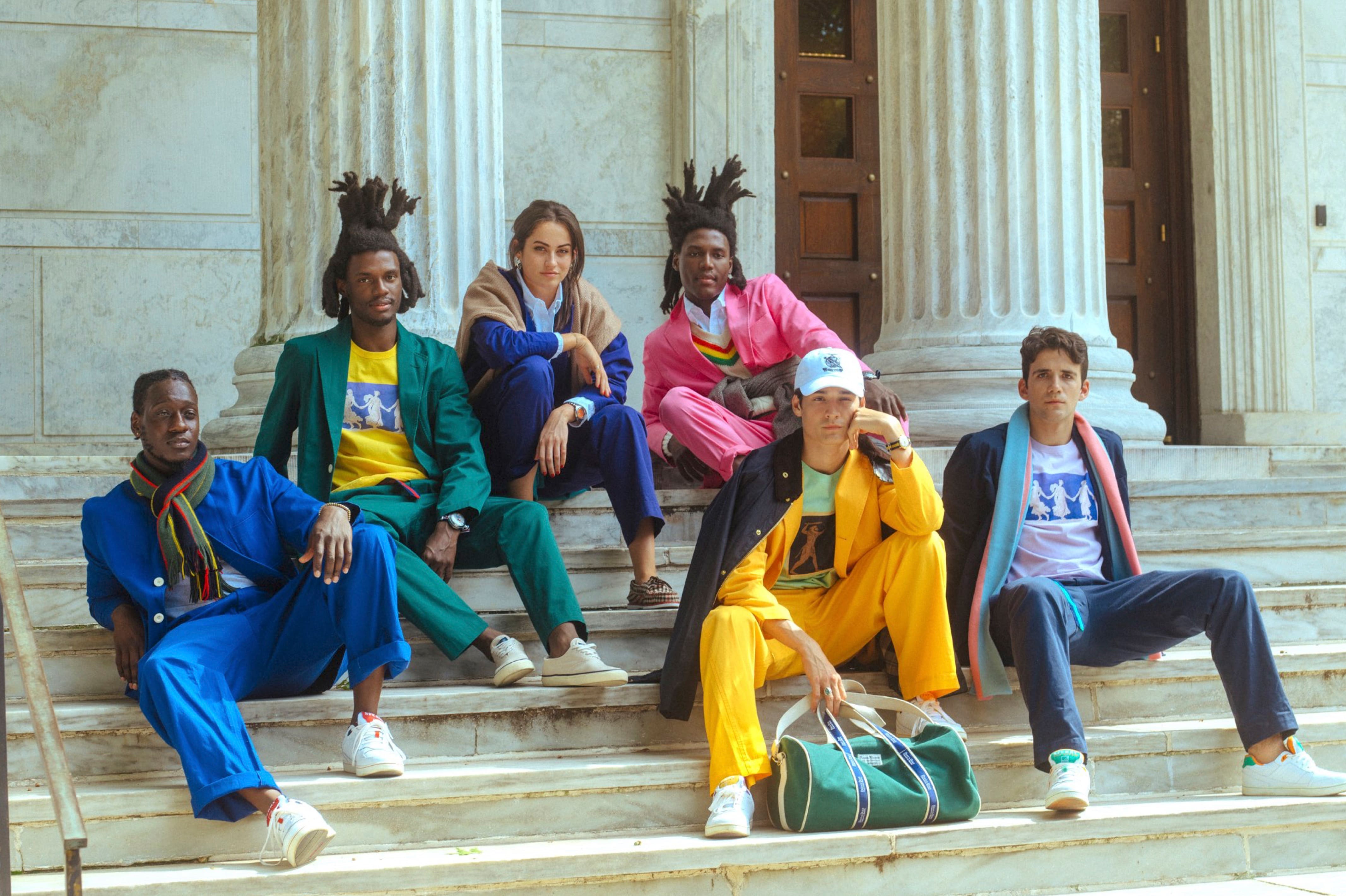 Male model wearing the Wedgewood Tee in yellow. Male model wearing the Cotton Twill Tailored Trousers in royal blue. Male model wearing the Cotton Twill Tailored Trousers in gold. Male model wearing the Cotton Twill Tailored Trousers in pink