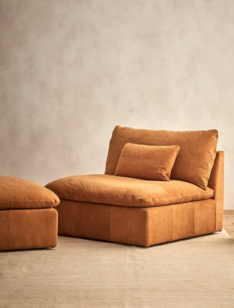 Aria Chair in Sunset Canyon, Meridian Leather alongside the Aria Leather Ottoman