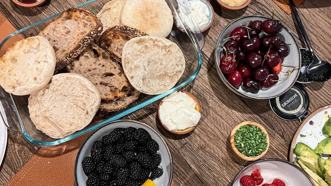 fruits and bread placed on a tabletop
