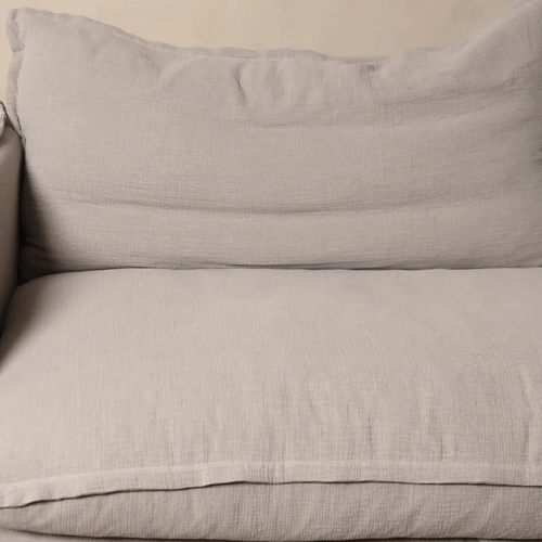 Animation of person fluffing a back cushion