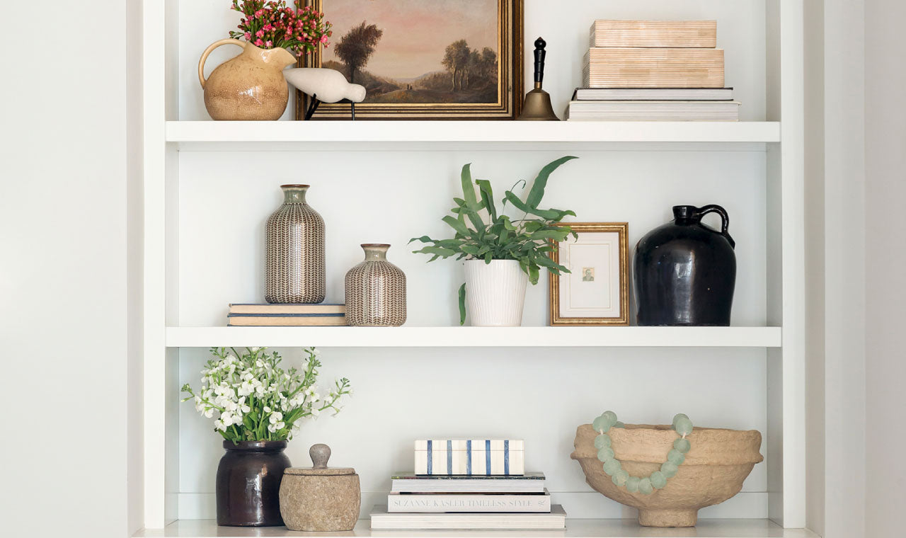 Minimalist White Bookshelf with vases 