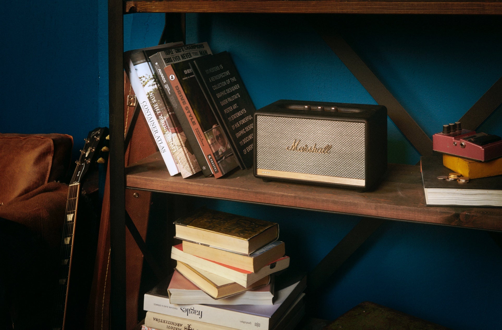 Marshall Acton II on wooden bookshelf