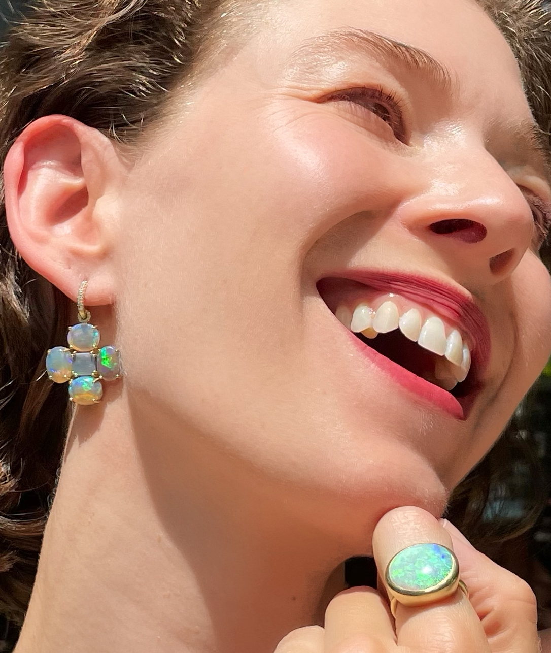                                 Capture the magic with lit-from-within opals, an unexpected option for utterly electric elegance. If your hair will be down, these earrings are sure to shine through. 
            
            