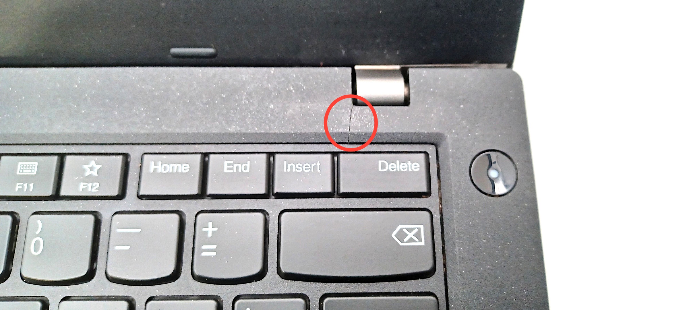 Device #1 - small crack in palm rest