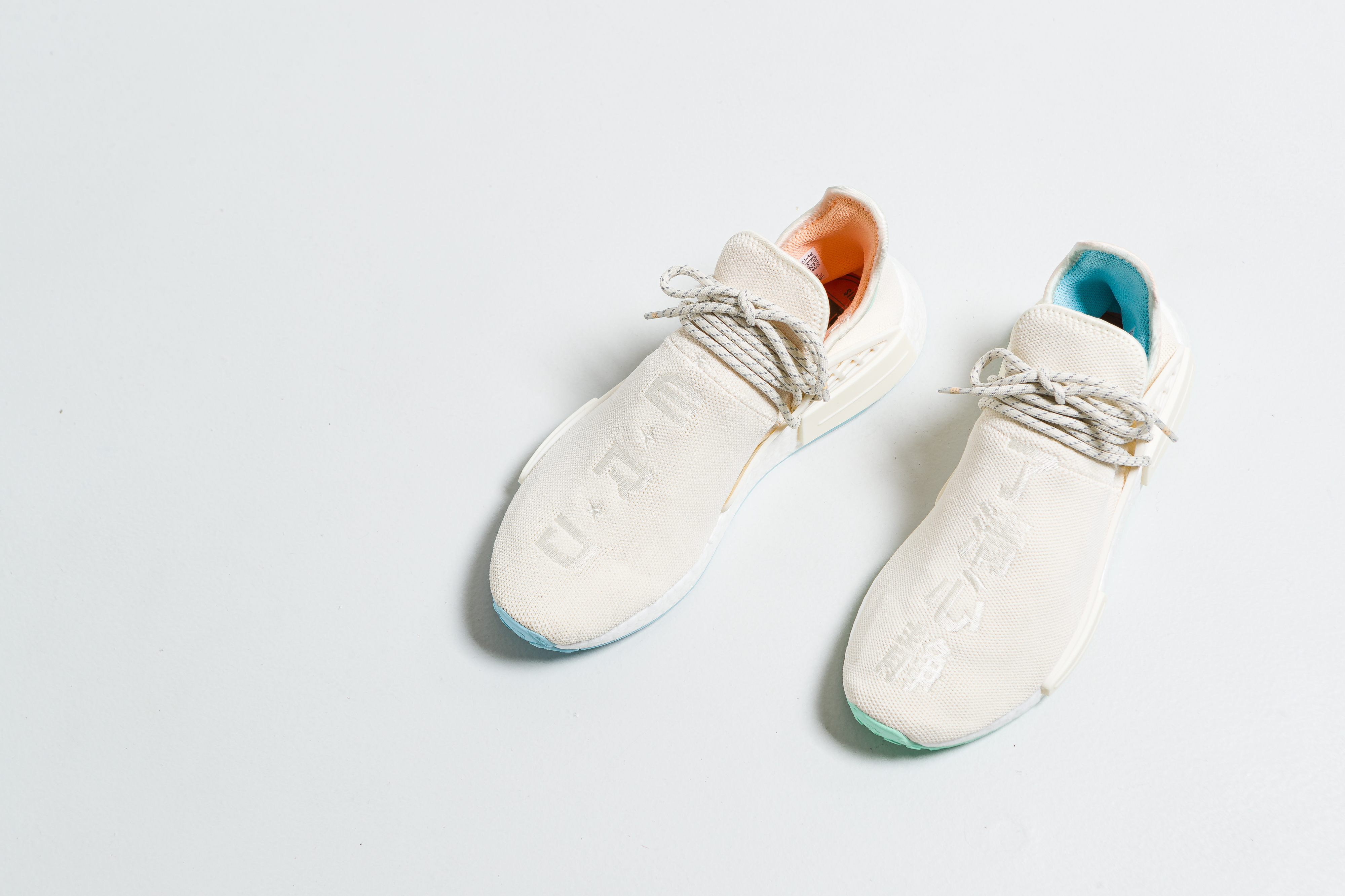 Up There Launches - adidas Originals X HU NMD N.E.R.D. - Core White/Glow Orange/Clear Mint