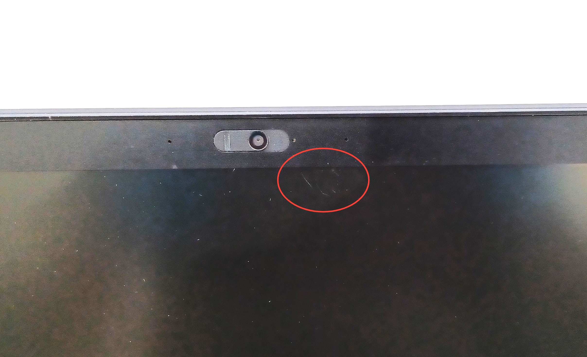 Device #1 - small scratches near webcam