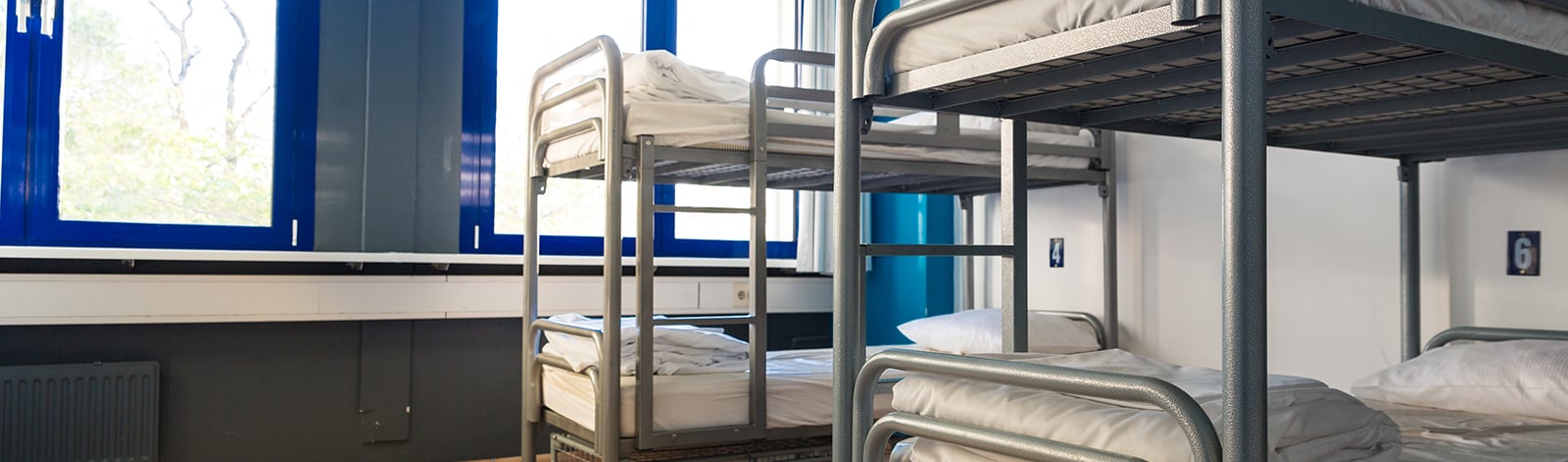 Hostel interior with a set of bunk beds