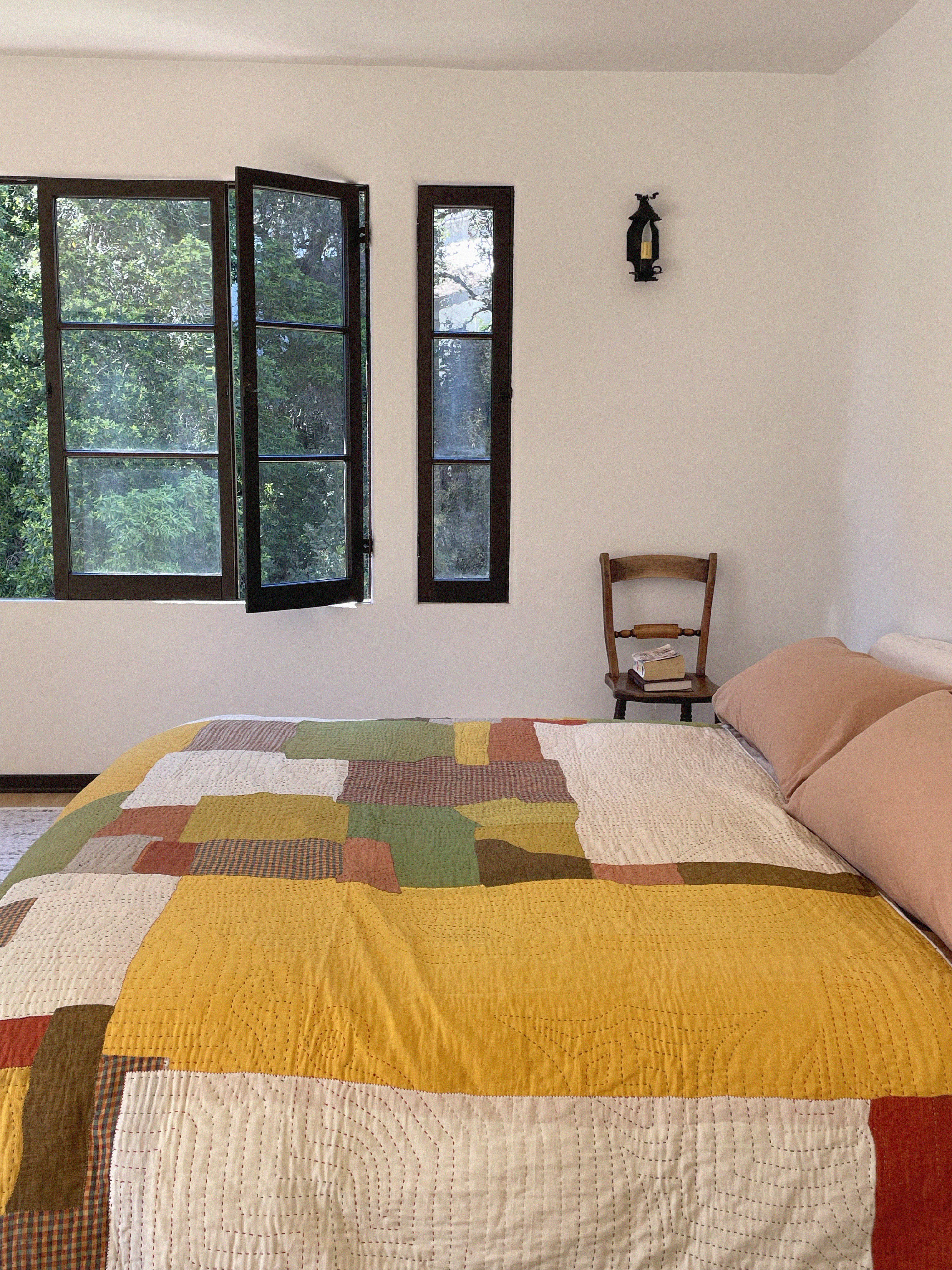 Quilts in bedroom.