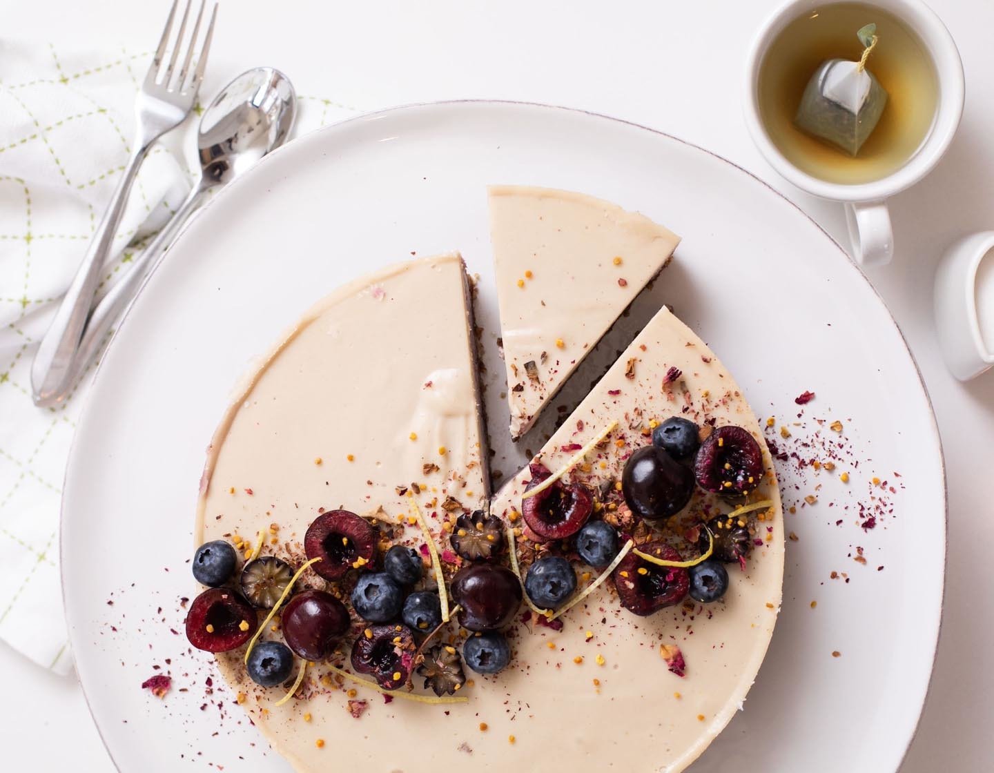 Cherry Blossom Cashew Cheesecake from above with tea