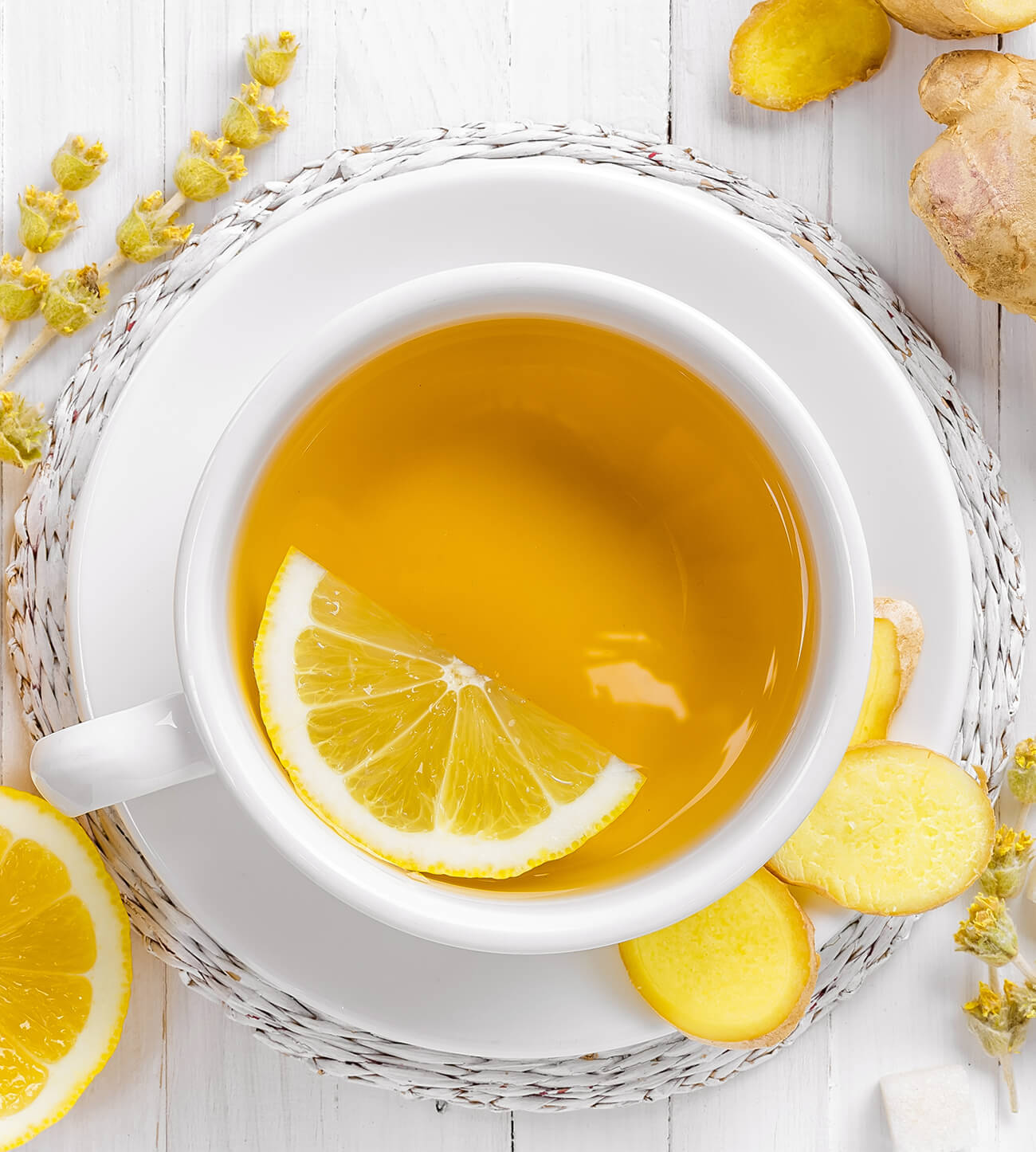 Herbal tea with lemon in a white cup