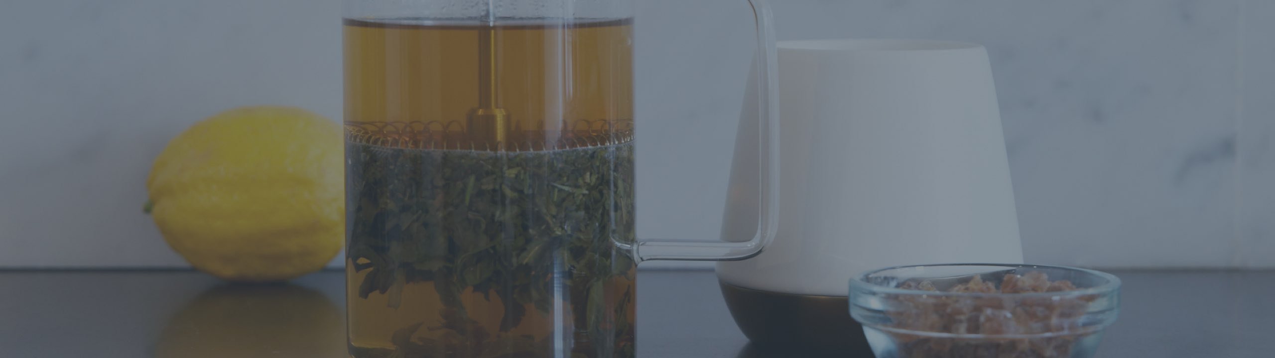 Cup and tea press of tea
