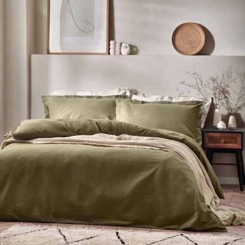 A 100% cotton duvet set with a waffle weave texture in an earthy olive shade.