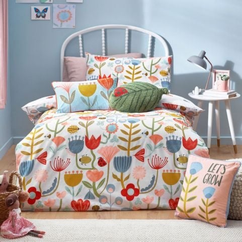 A cotton-rich kids' duvet set with a multicoloured design of abstract flowers and garden insects.