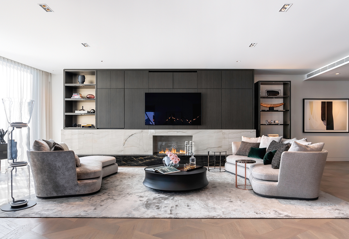 The living space features the Maxalto Apollo Sofas and Frank Side Tables by B&B Italia. Photo © Justin Alexander. 
