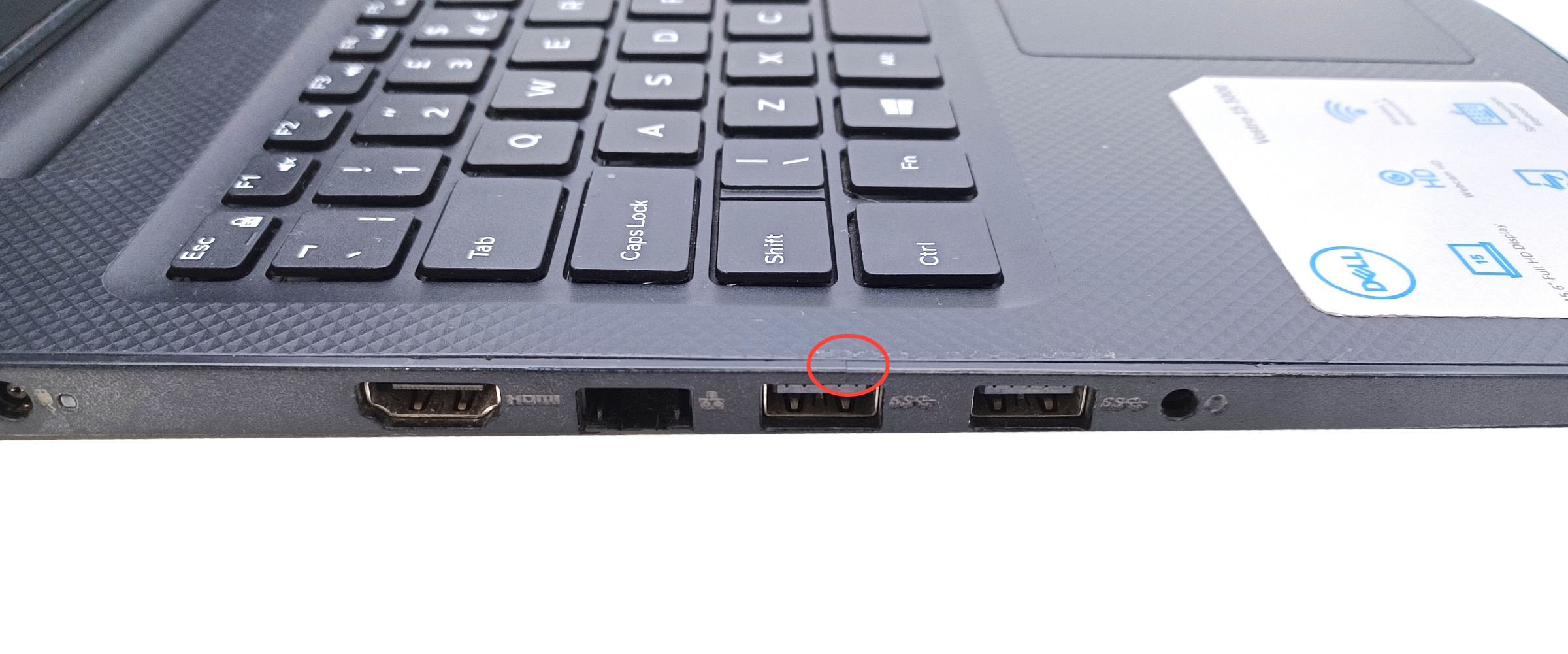 Device #1 - small crack in palm rest above USB port