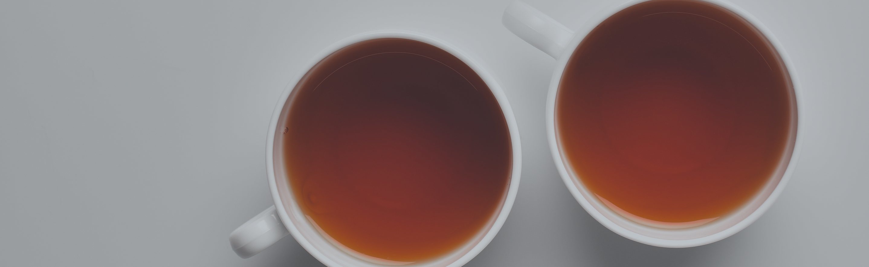 Two cups of black tea from above