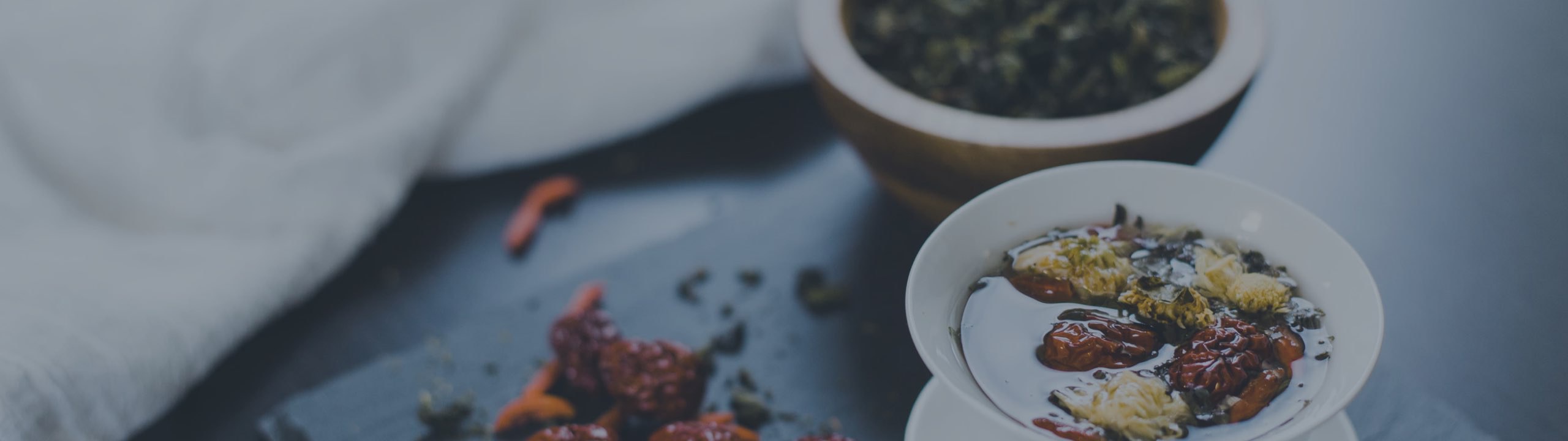 Loose tea leaves on a small plate