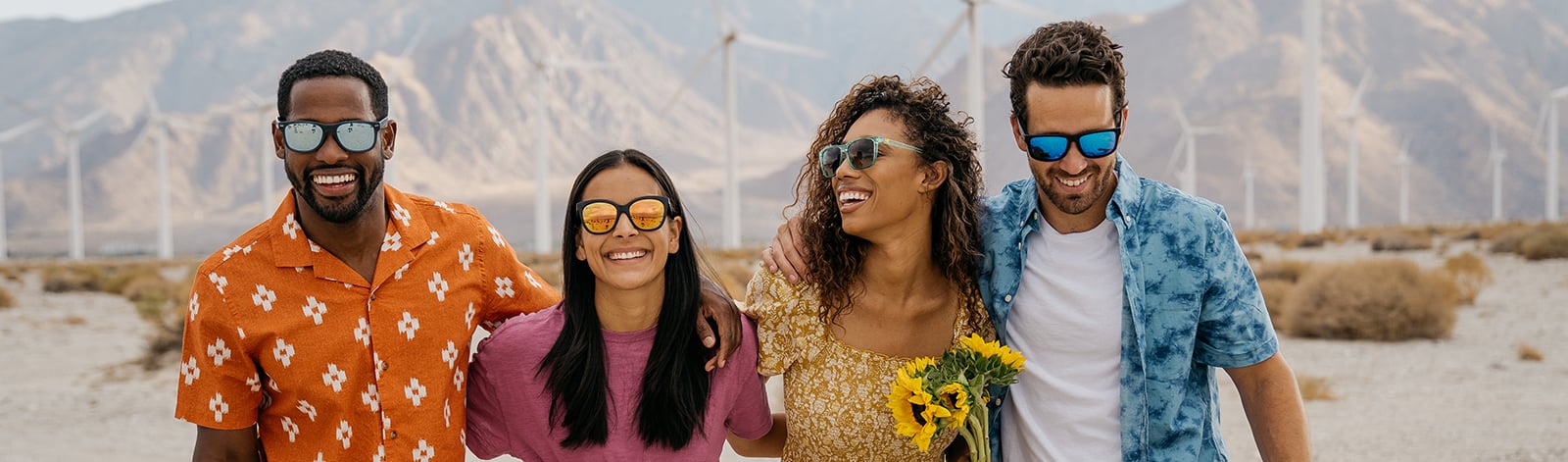 Four young people in Palm Springs wearing Knockaround sunglasses