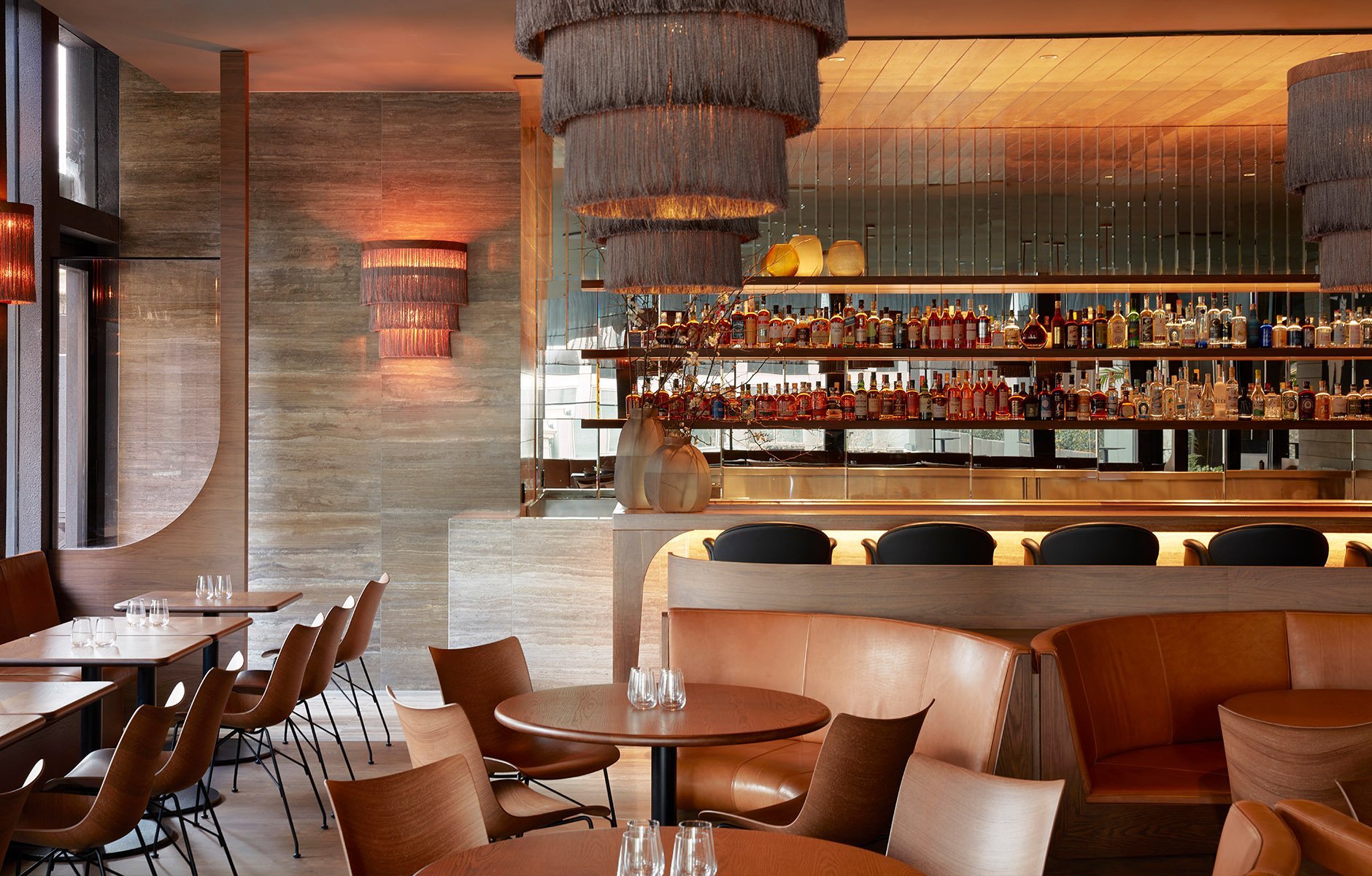The Lillian Terrace @societyrestaurant and its relaxed dining experience features the soft curves of the P/Wood chair designed by Philippe Starck for Kartell. Photo © Sean Fennessy @seanfennessy.