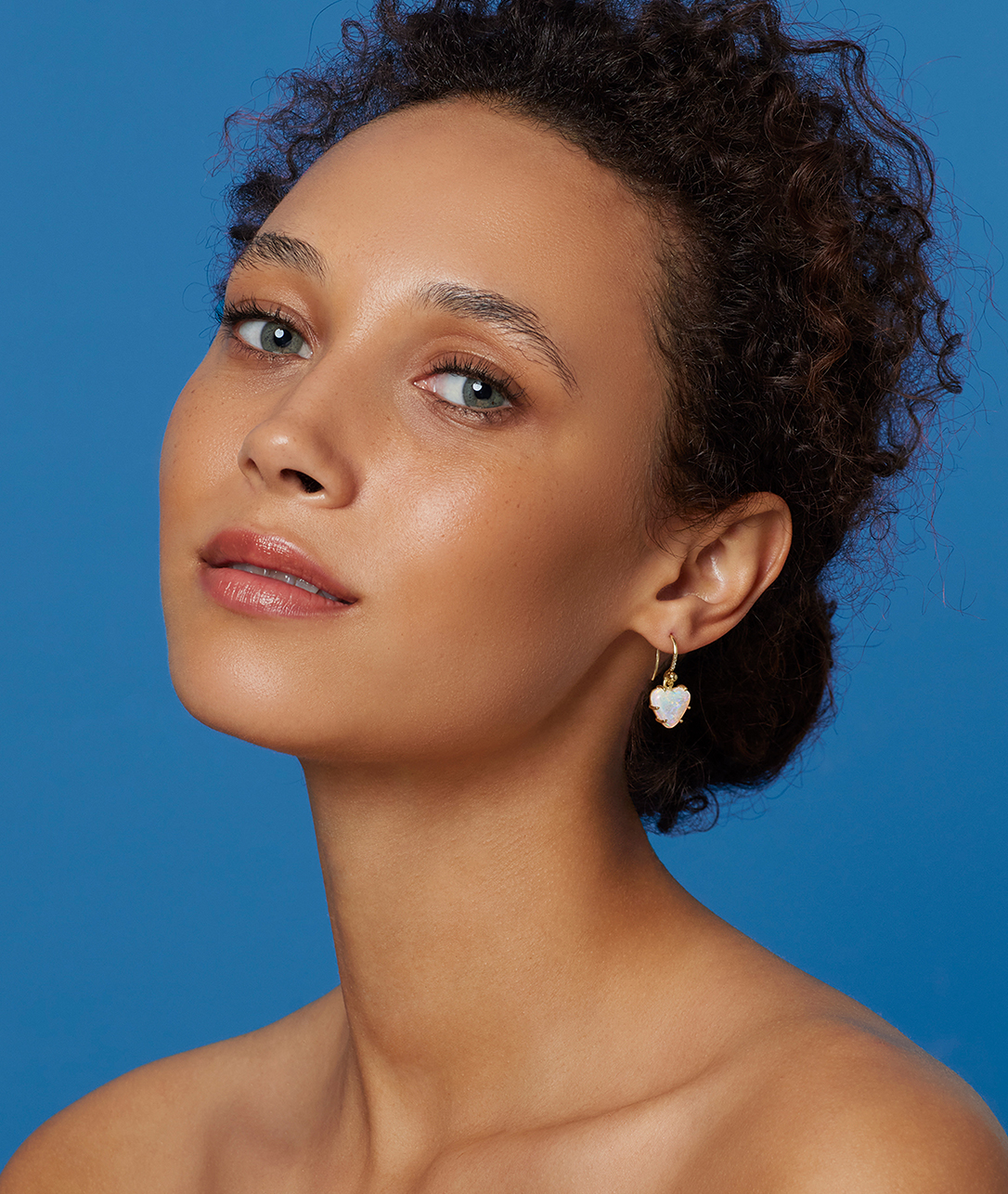 A pair of full heart-shaped stones on view in 18k gold settings can't lose.SHOP OPAL LOVE EARRINGS