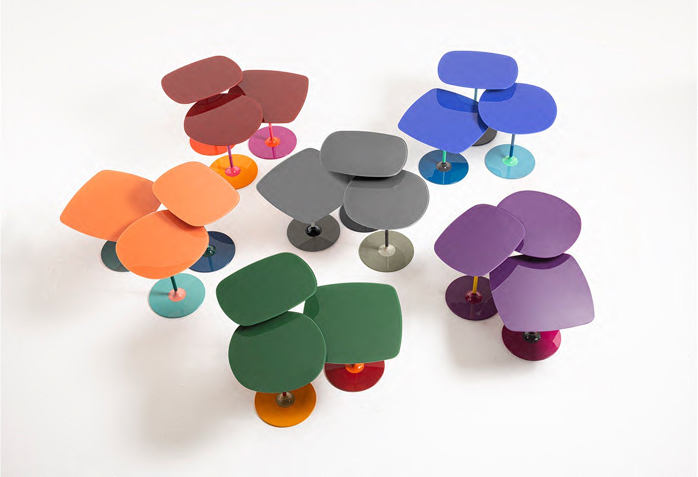 The colourful Thierry tables designed by Piero Lissoni for Kartell. Photo c/o Kartell. 