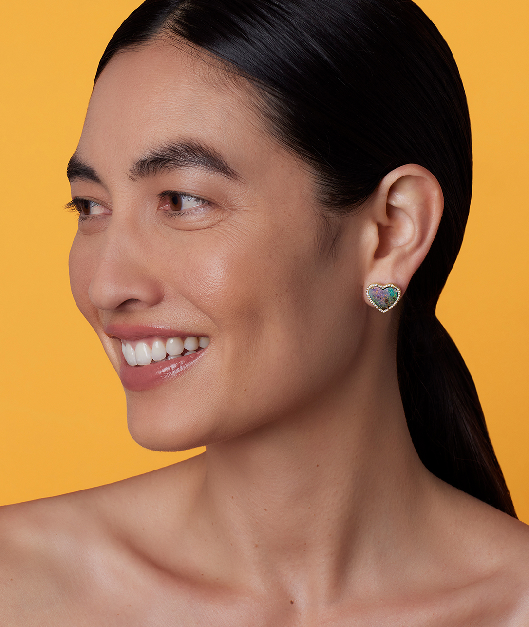 Heart-shaped opal studs with diamond pavé put the extra in extraordinary.SHOP OPAL LOVE